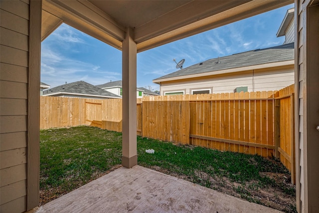 view of yard with a patio area and a fenced backyard