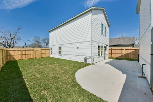 6835 New York St, Houston, TX 77021 - exterior space with a fenced backyard, a patio, and a lawn