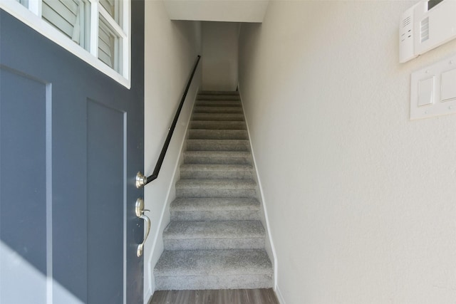 6835 New York St, Houston, TX 77021 - staircase featuring baseboards and wood finished floors