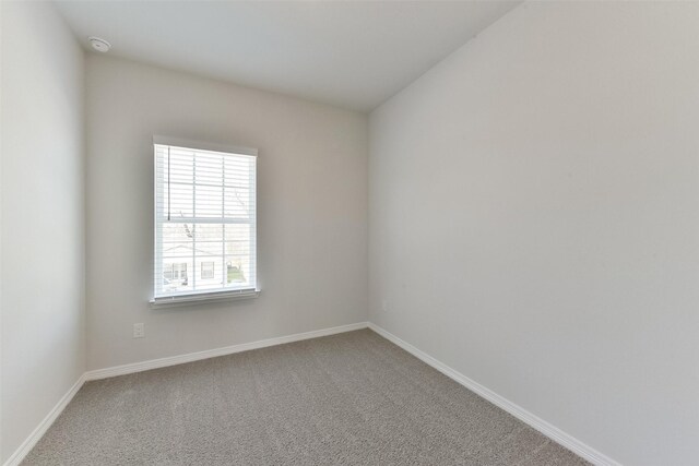 6835 New York St, Houston, TX 77021 - carpeted spare room with baseboards