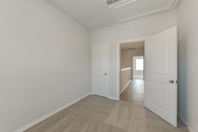 6835 New York St, Houston, TX 77021 - carpeted empty room featuring attic access and baseboards