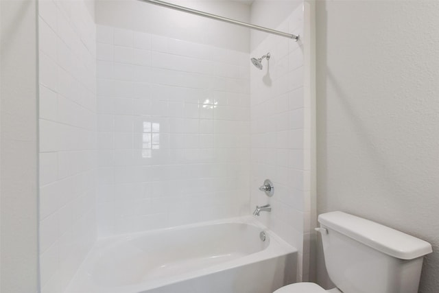 6835 New York St, Houston, TX 77021 - bathroom with shower / bath combination, a textured wall, and toilet