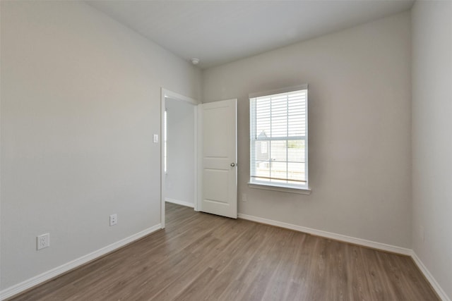 6835 New York St, Houston, TX 77021 - unfurnished room featuring baseboards and wood finished floors
