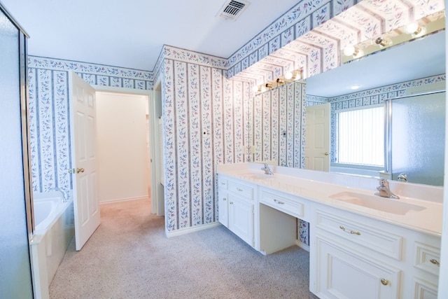 bathroom with a garden tub, a sink, carpet flooring, visible vents, and wallpapered walls