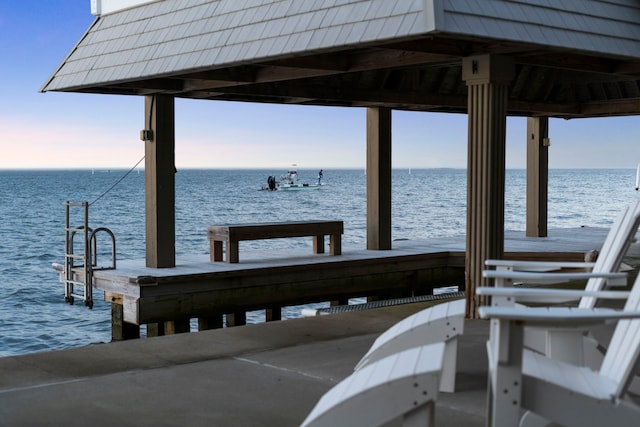 dock area featuring a water view