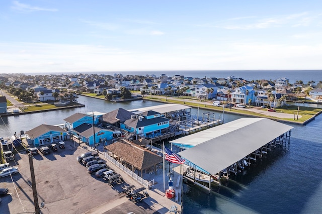 aerial view featuring a water view and a residential view