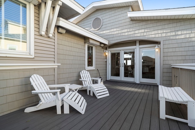 wooden terrace featuring french doors