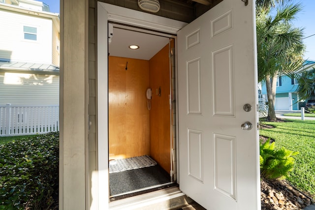 property entrance featuring stucco siding