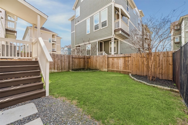 view of yard featuring a fenced backyard