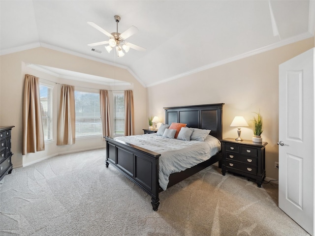 bedroom with ornamental molding, light colored carpet, vaulted ceiling, and visible vents