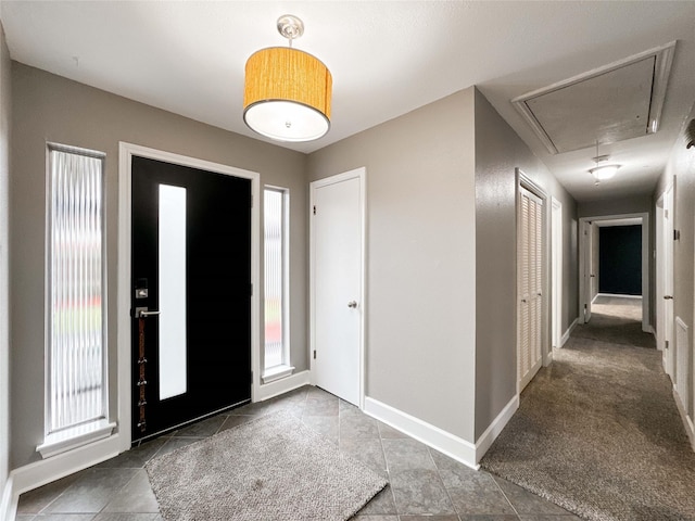 entrance foyer with a wealth of natural light and baseboards