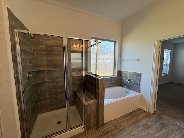 full bath with a stall shower, baseboards, ornamental molding, wood tiled floor, and a bath