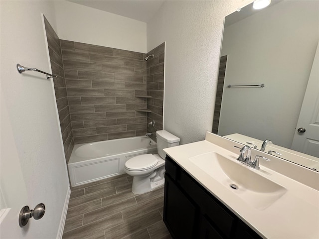 full bath featuring a textured wall, toilet, wood tiled floor, vanity, and shower / bathing tub combination