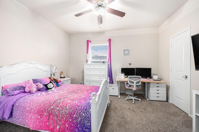 bedroom with a ceiling fan and carpet flooring