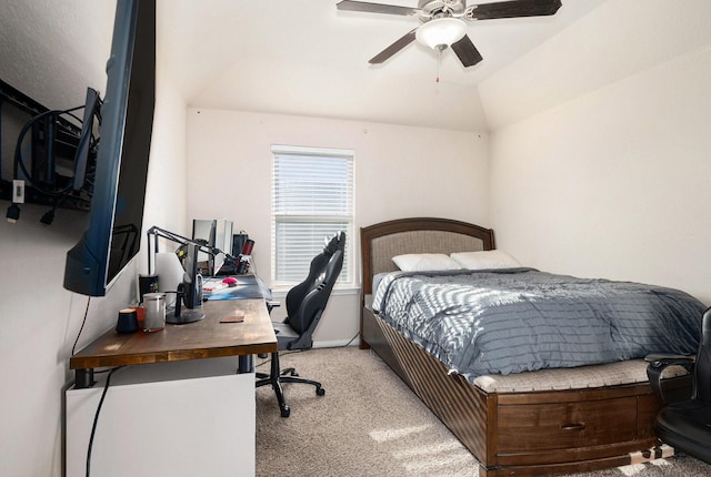 bedroom featuring light carpet, ceiling fan, baseboards, and lofted ceiling