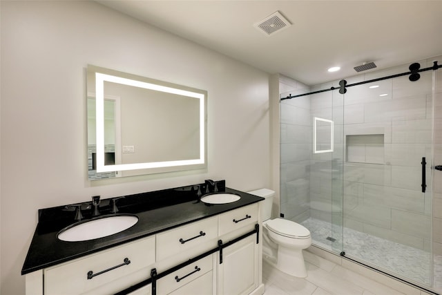 full bath featuring toilet, visible vents, a sink, and a stall shower
