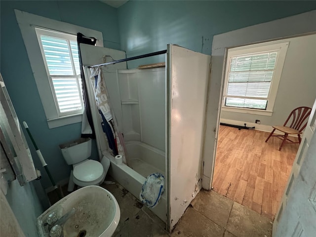 bathroom featuring toilet and shower / bathtub combination with curtain