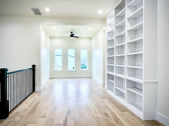 unfurnished room with baseboards, visible vents, a ceiling fan, light wood-type flooring, and recessed lighting