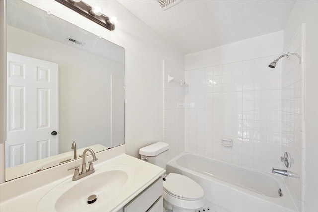 full bathroom featuring shower / bath combination, visible vents, toilet, a textured ceiling, and vanity