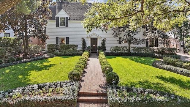 view of front of property with a front lawn