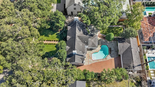 birds eye view of property with a residential view