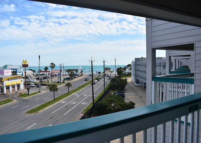 balcony featuring a water view