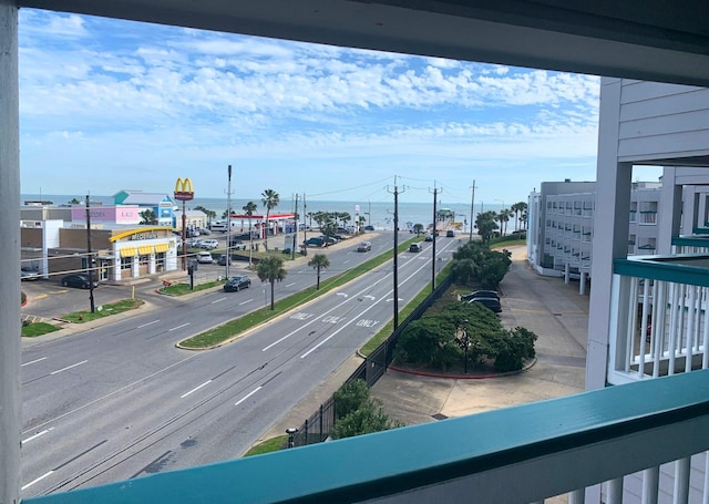 view of road featuring curbs and sidewalks