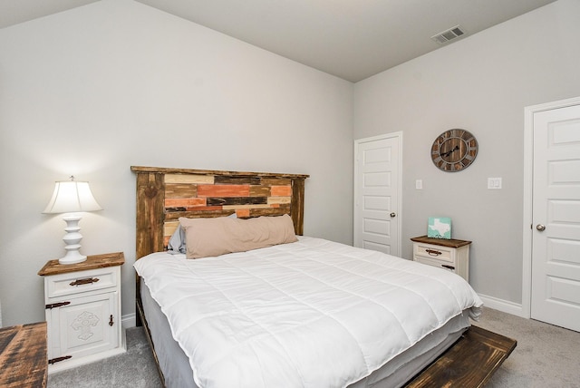 carpeted bedroom with baseboards and visible vents