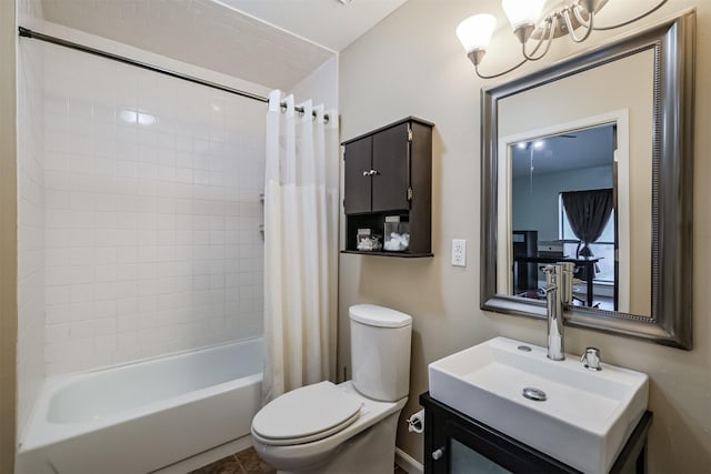 full bathroom featuring shower / bath combo, vanity, and toilet