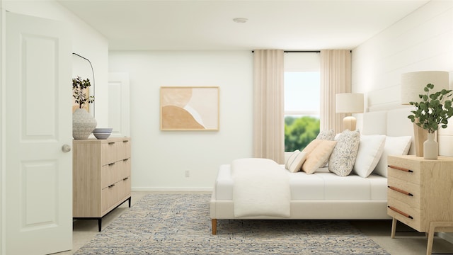 bedroom featuring baseboards