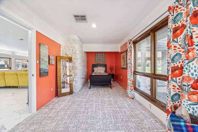 sitting room with marble finish floor, visible vents, and recessed lighting