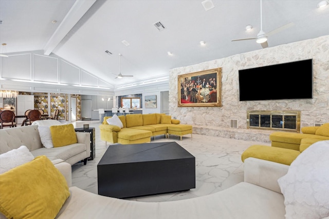 living room featuring a ceiling fan, marble finish floor, visible vents, and beam ceiling