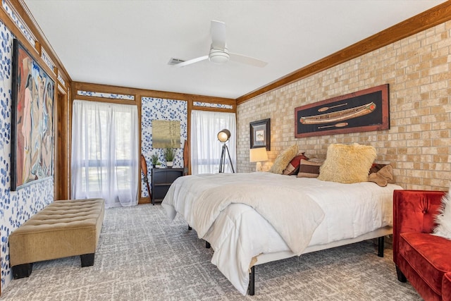 carpeted bedroom with ceiling fan, access to outside, ornamental molding, and visible vents