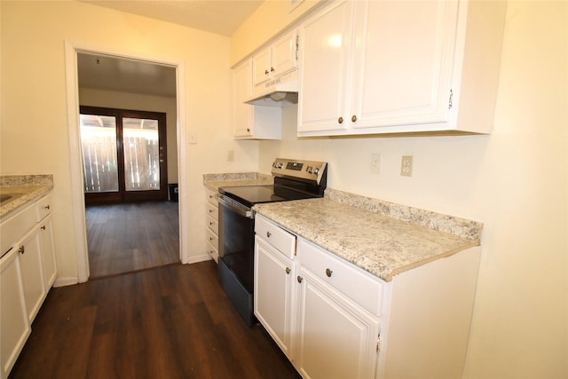 kitchen with dark wood-style floors, stainless steel electric range, white cabinets, under cabinet range hood, and baseboards