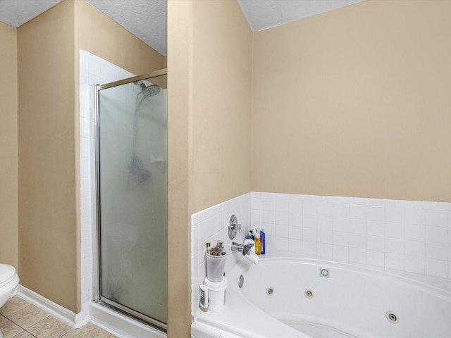 bathroom featuring a whirlpool tub, tile patterned flooring, toilet, and a shower stall