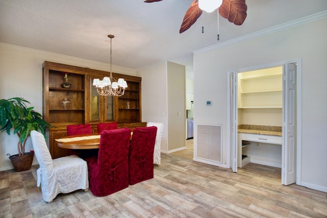 dining space featuring visible vents, light wood-style floors, ornamental molding, baseboards, and ceiling fan with notable chandelier