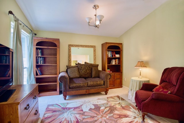 living area featuring a chandelier and vaulted ceiling