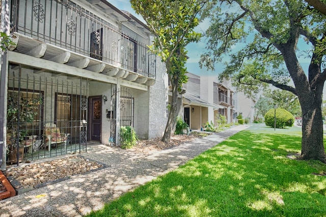 surrounding community featuring a lawn