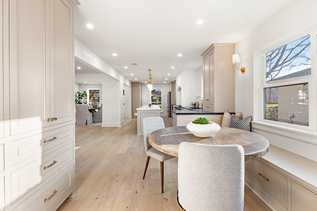 dining room featuring light wood-style floors and recessed lighting