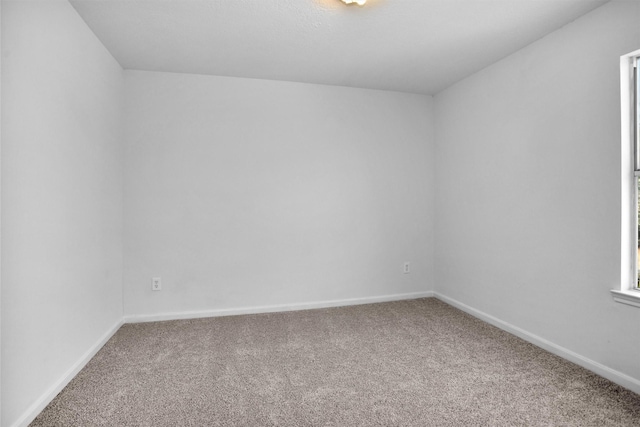 13757 Bighorn Trl, Willis, TX 77378 - carpeted empty room featuring baseboards