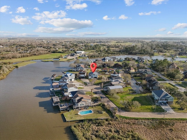 aerial view featuring a water view and a residential view