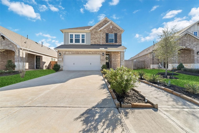 view of front of house with concrete driveway, brick siding, fence, and an attached garage