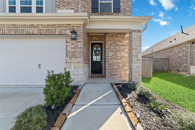 property entrance with brick siding and fence