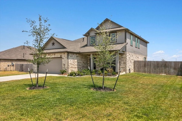 view of front of house featuring driveway, fence, a front lawn, and brick siding