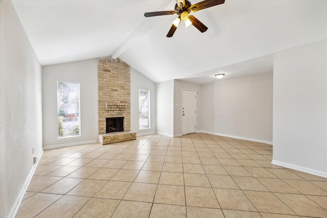 unfurnished living room featuring baseboards, lofted ceiling with beams, ceiling fan, a brick fireplace, and light tile patterned flooring