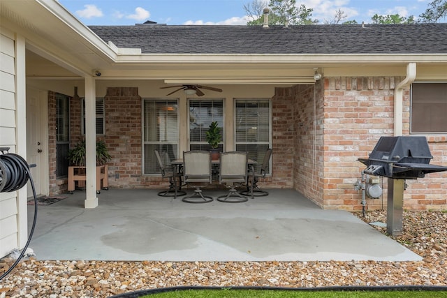 view of patio / terrace featuring outdoor dining space, ceiling fan, and grilling area