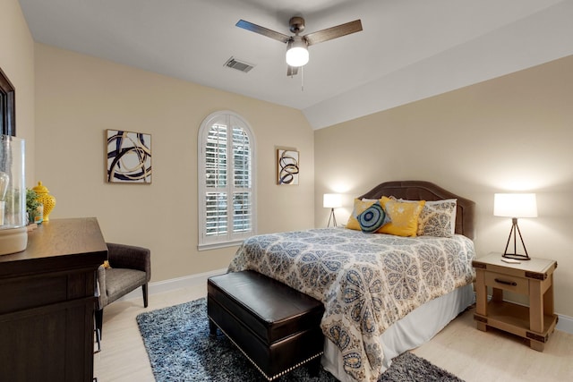 bedroom with visible vents, vaulted ceiling, baseboards, and ceiling fan