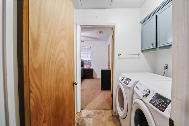 laundry room featuring light carpet, cabinet space, attic access, visible vents, and washer and dryer