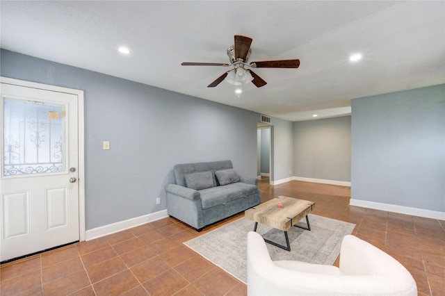 tiled living area featuring recessed lighting, visible vents, ceiling fan, and baseboards