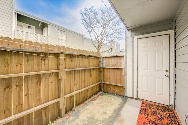 view of patio with fence